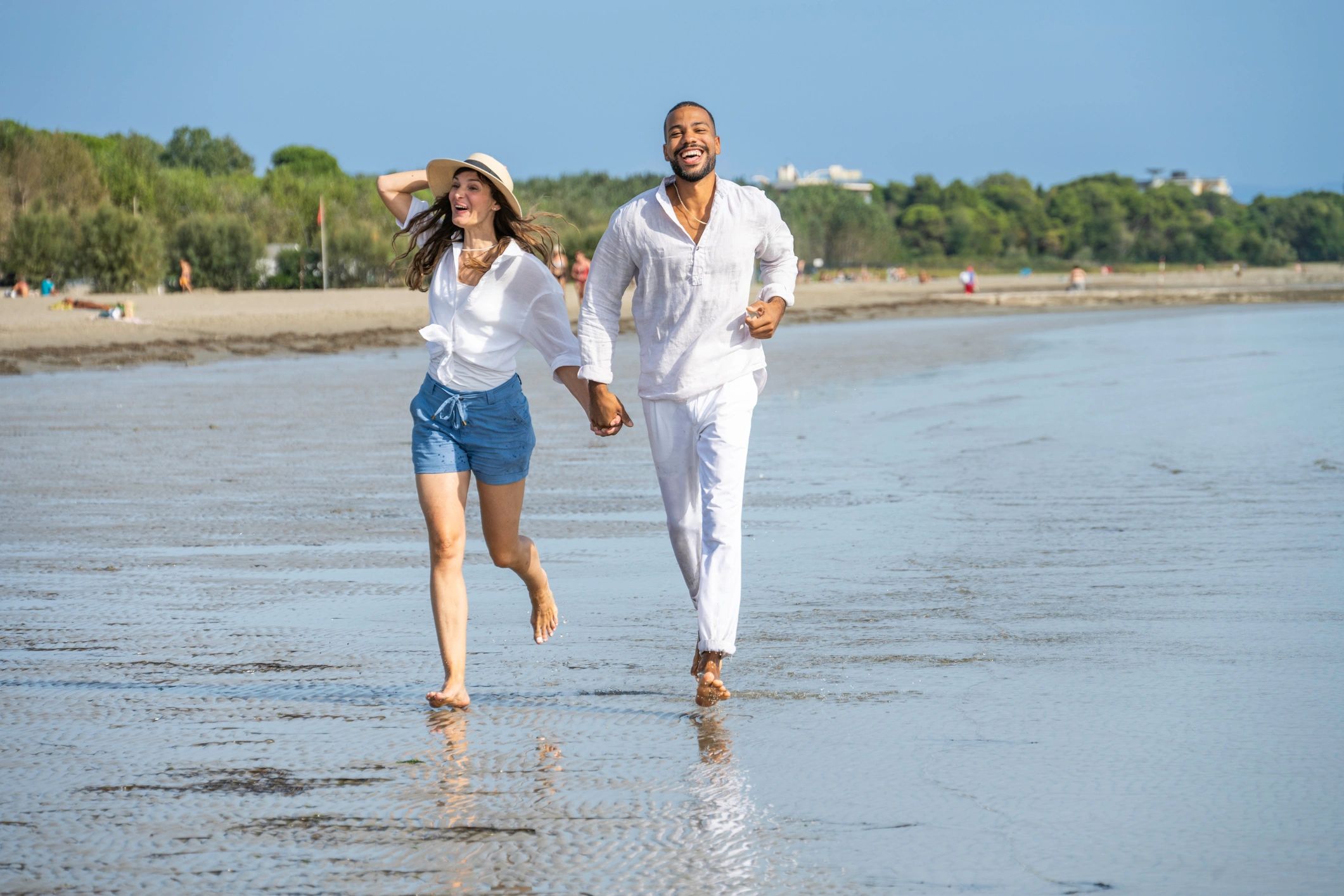 Couple enjoying a carefree beach vacation